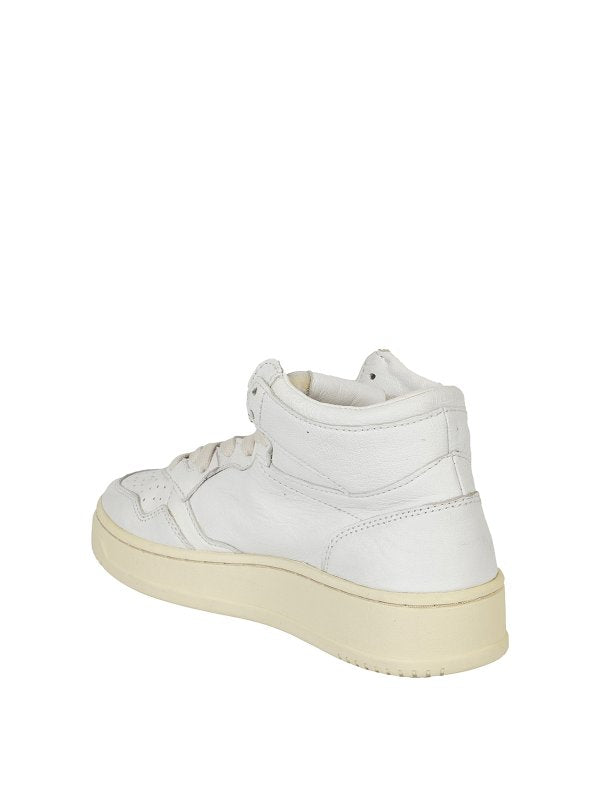 Sneakers In Pelle