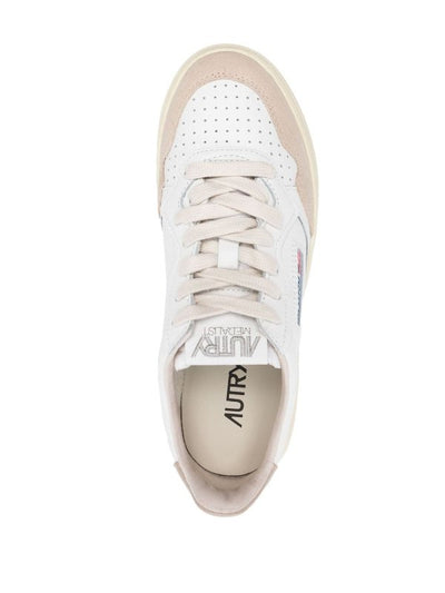 Sneakers In Pelle