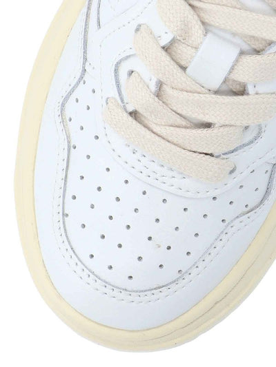Sneakers In Pelle