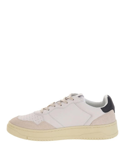 Sneakers In Pelle