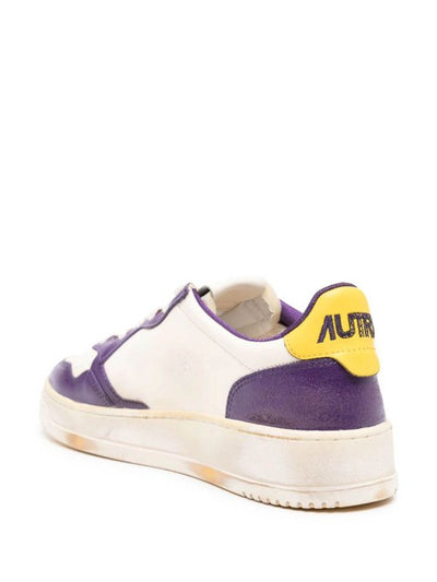 Sneakers In Pelle