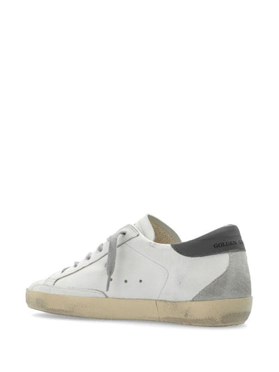 Sneakers In Pelle